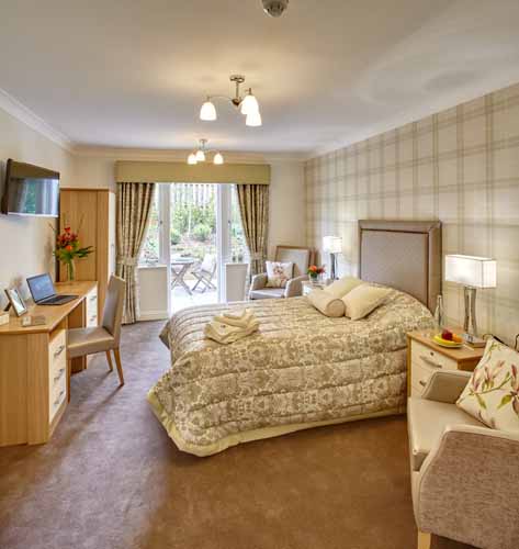 bedroom of Merlin Court Care Private Home