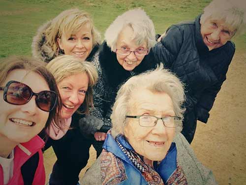 residents and care staff enjoy a day trip
