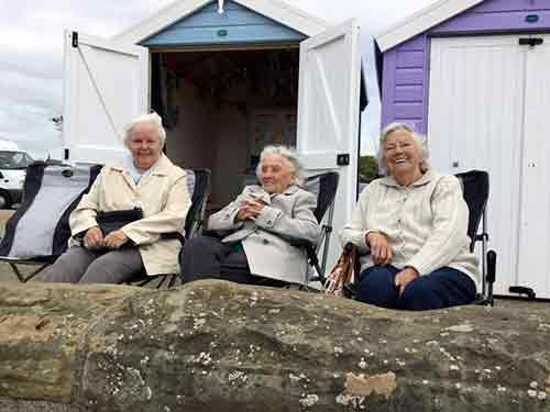Avery residents relax in beach hut